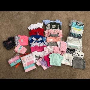 Newborn clothing lot.